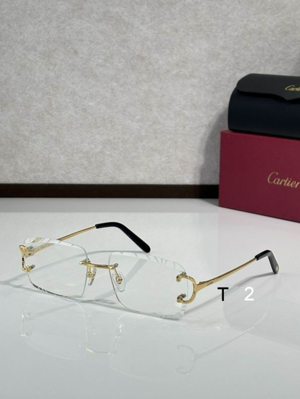 Crtir Glasses - Rimless Rectangular Clear Lens Gold Panther Arms