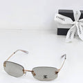 Chnel Glass - Rimless Rose Gold Smoke Lens