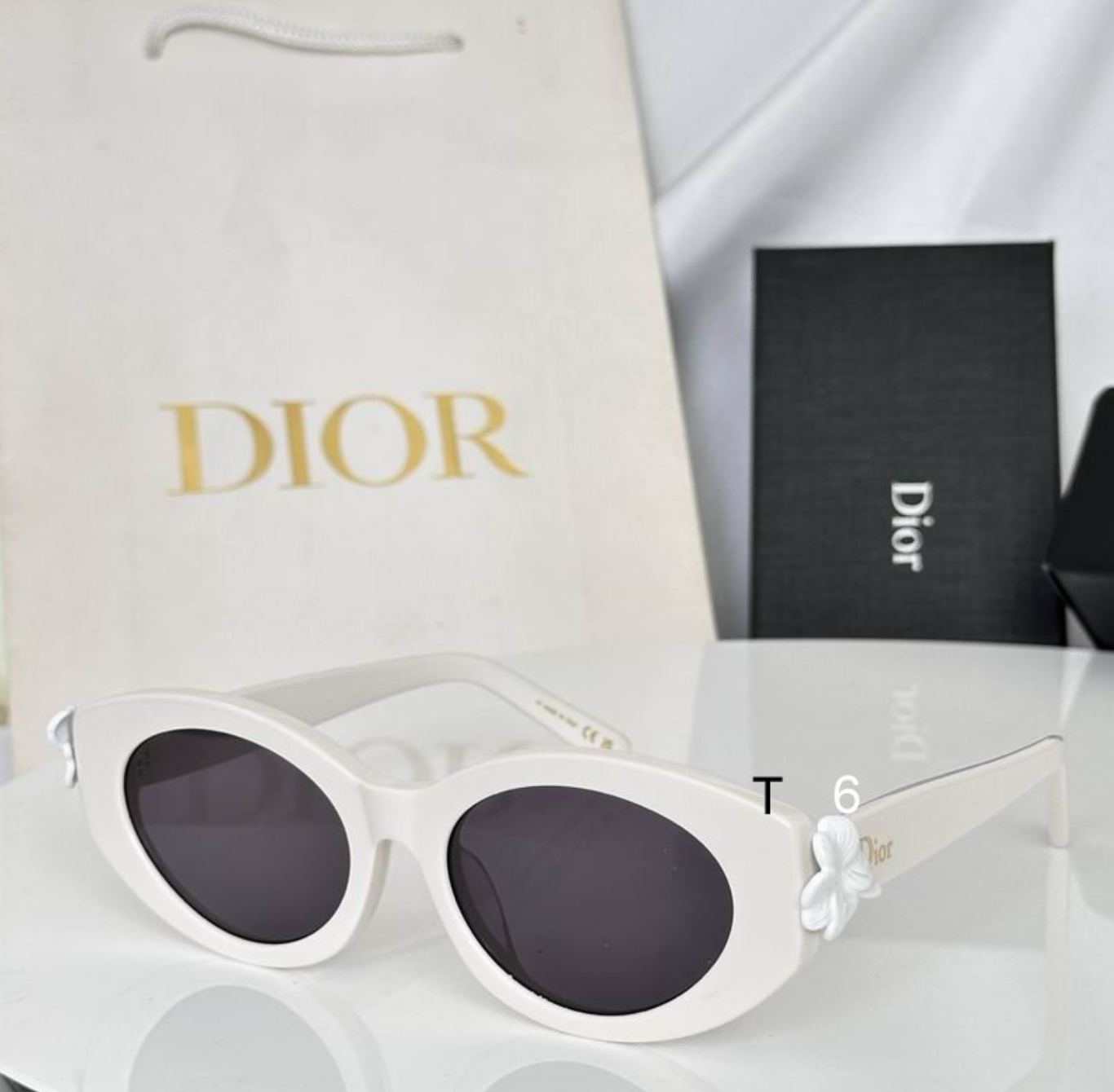 Dr Glasses - White Small Oval with Dark Gray Lenses and White Flower Petal Hinge Decoration