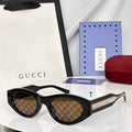 Gci Glasses - Black Oval GG Monogram Brown Lens