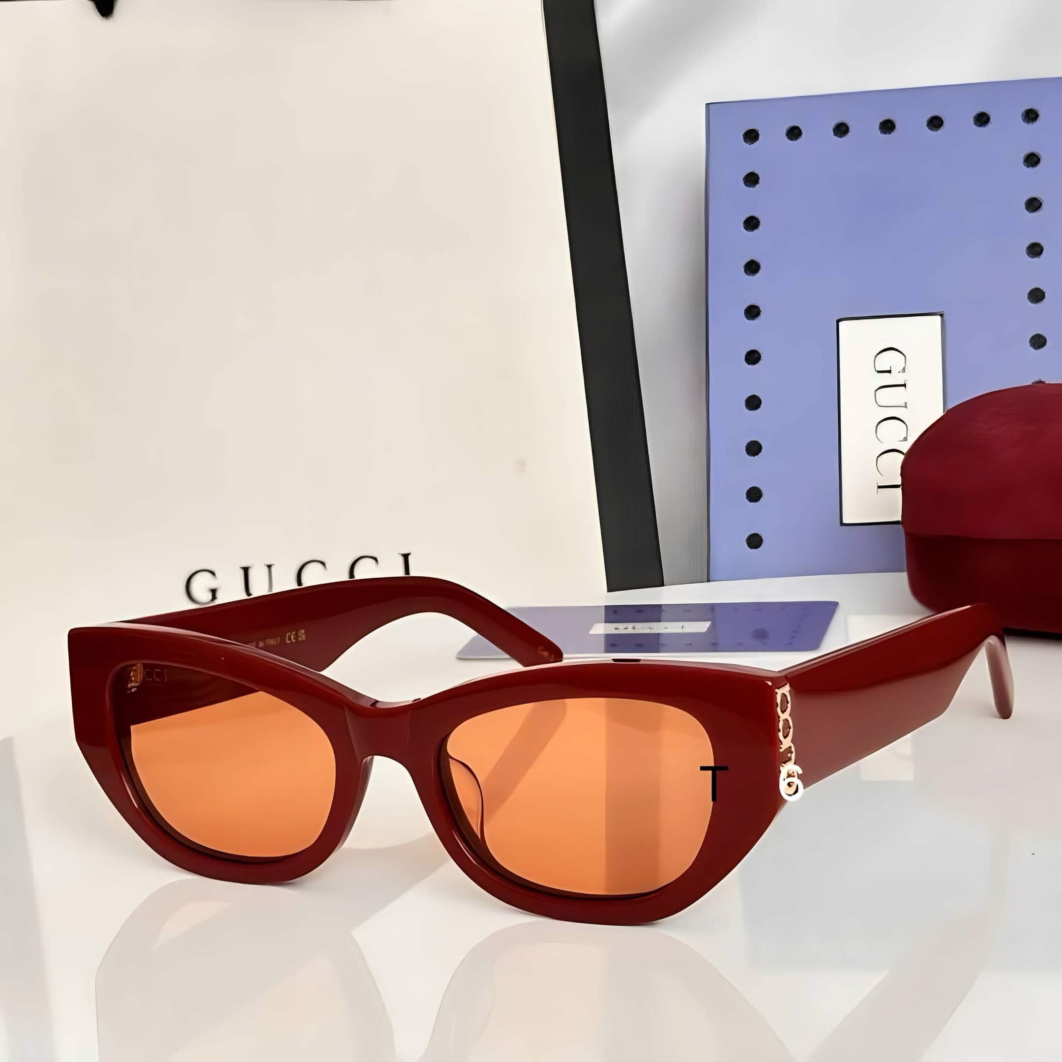 Gci Glasses - Burgundy Cat-Eye Gold Chain Temple Orange Lenses