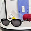 Gci Glasses - Black Oval Silver G Logo Dark Lens