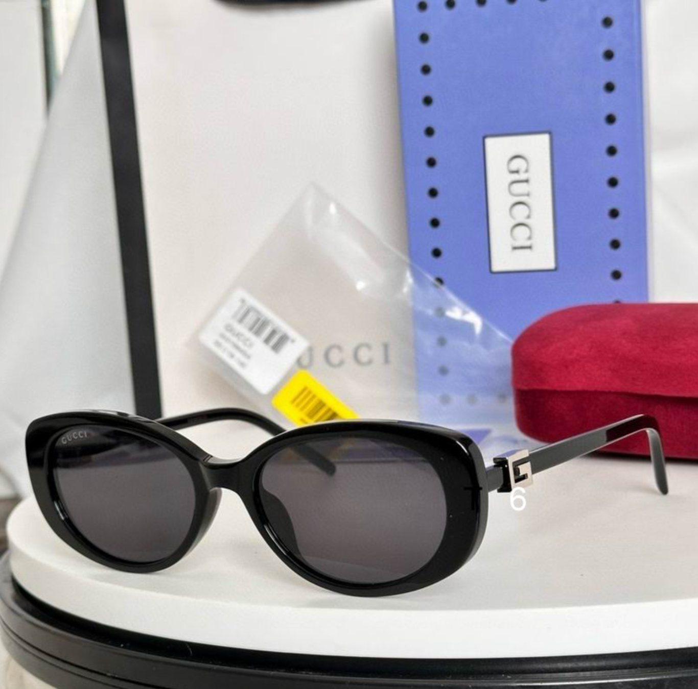 Gci Glasses - Black Oval Silver G Logo Dark Lens